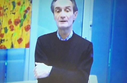 Il governatore Fontana apparso in video durante la conferenza stampa in Regione