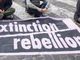 Brescia, Extinction Rebellion denuncia: &quot;Attiviste costrette a spogliarsi e fare squat in questura&quot;