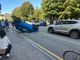 Robecco, incidente in piazza XXI Luglio: auto ribaltata, tre persone coinvolte, traffico in tilt