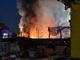 Milano, maxi incendio in area camper al Gratosoglio