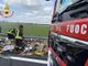 In fiamme un cassone contenente cartone pressato