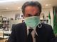 Attilio Fontana con la mascherina in diretta Facebook