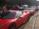 Sfilata di rosse nel cuore di Milano per il 34° Raduno Internazionale