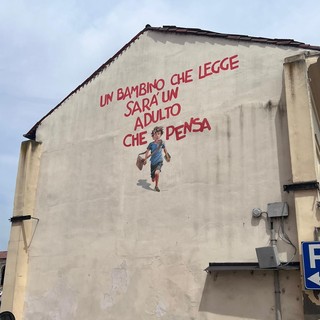- FOTONOTIZIA - Pieve del Cairo, murales sulla parete di piazza Corte Grande