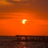 Eclissi parziale di sole, lo spettacolo al tramonto nei cieli d'Italia Eclissi parziale di sole, lo spettacolo al tramonto nei cieli d'Italia